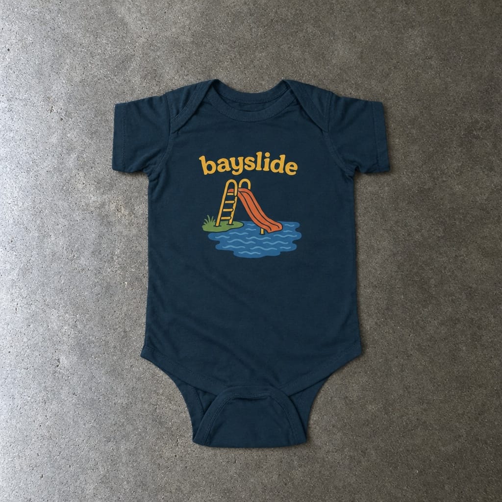Bayslide onesie in navy, laid flat
