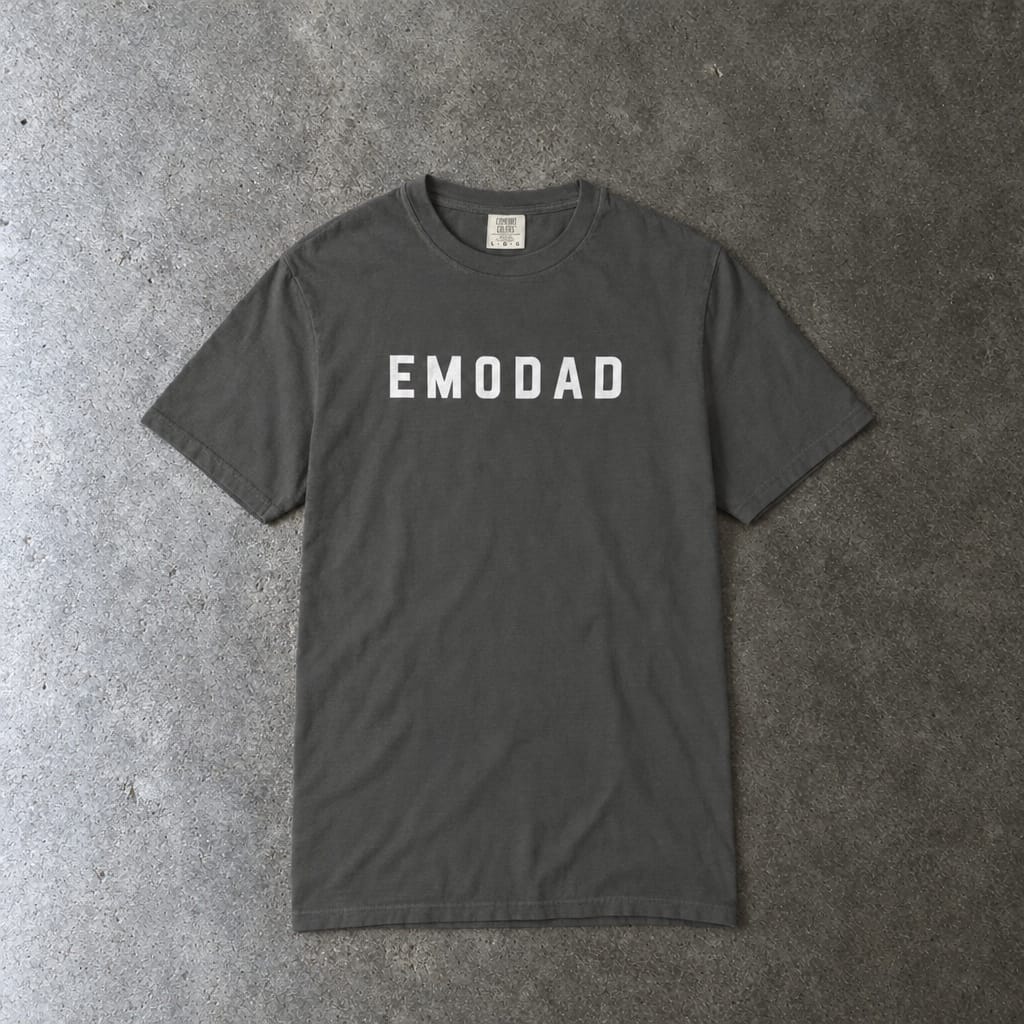 emodad Tee on Comfort Colors in pepper, laid flat