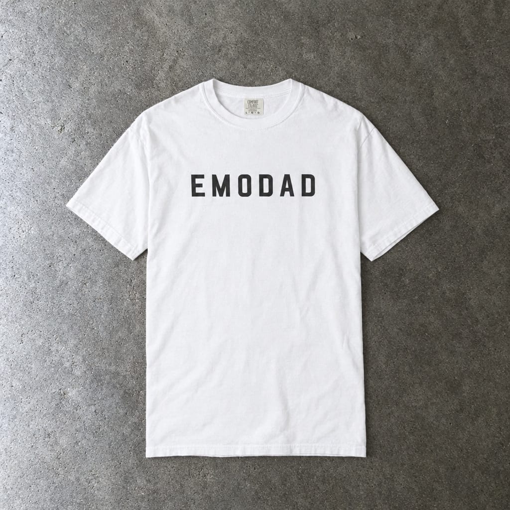emodad Tee on Comfort Colors in white, laid flat