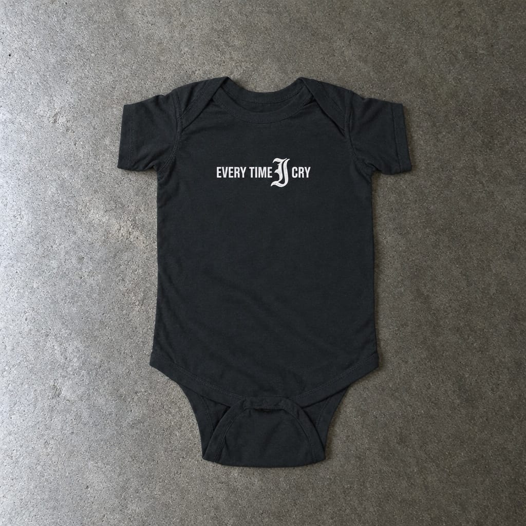 Every Time I Cry onesie in black, laid flat