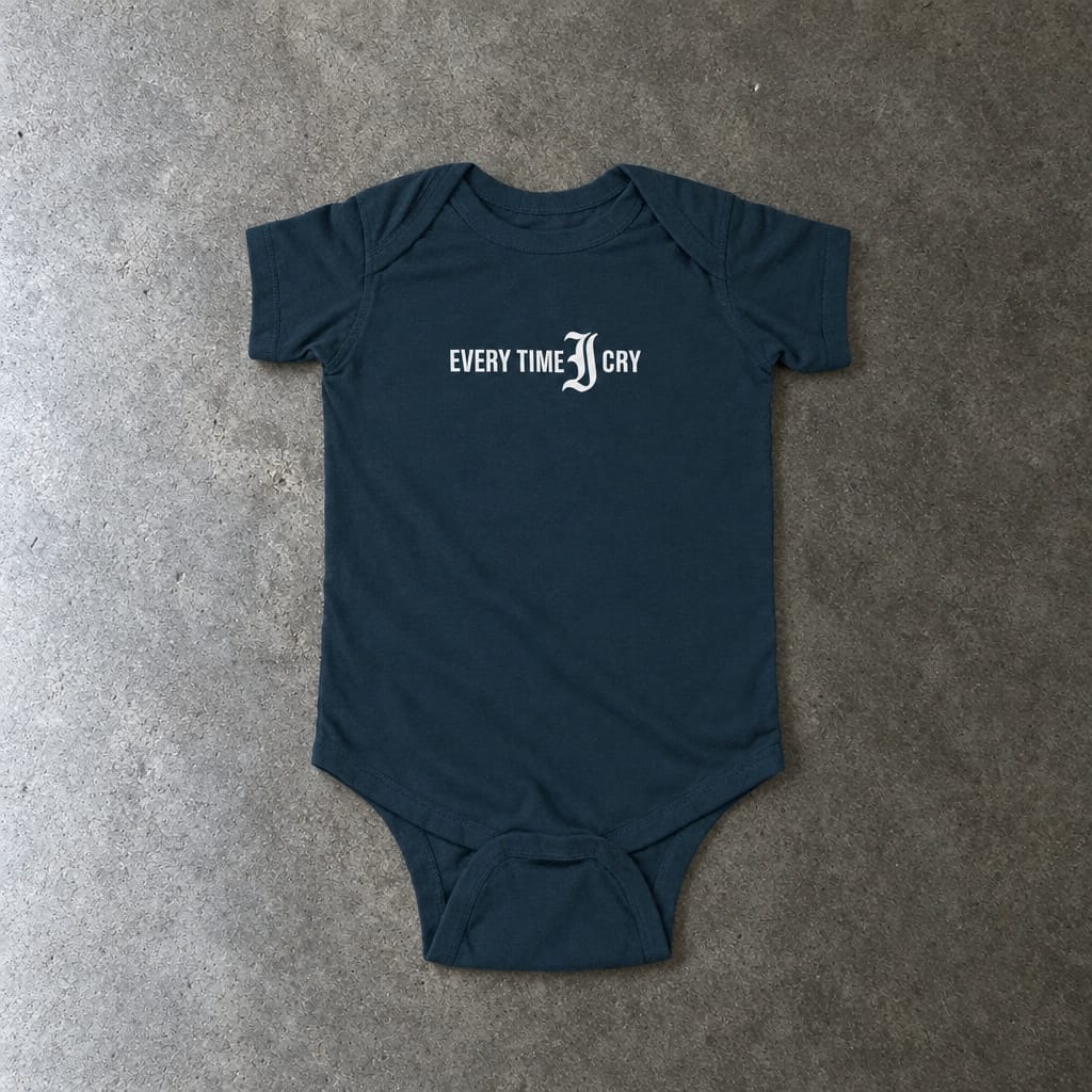 Every Time I Cry onesie in navy, laid flat