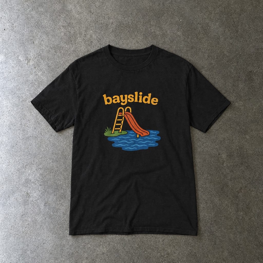 Bayslide youth tee in black, laid flat