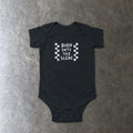 Born into the Scene Onesie in black, laid flat