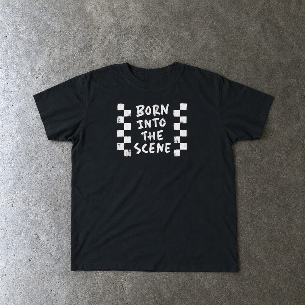 Born into the Scene toddler tee in black, laid flat