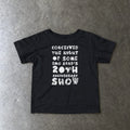 Conceived the Night of Some Emo Band's 20th Anniversary Show Baby Tee in black, laid flat