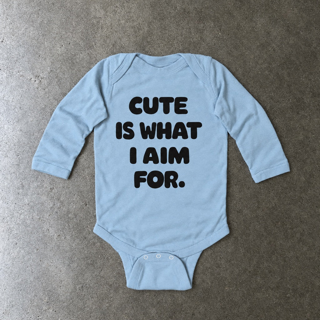 Cute Is What I Aim For long sleeve onesie in light blue, laid flat