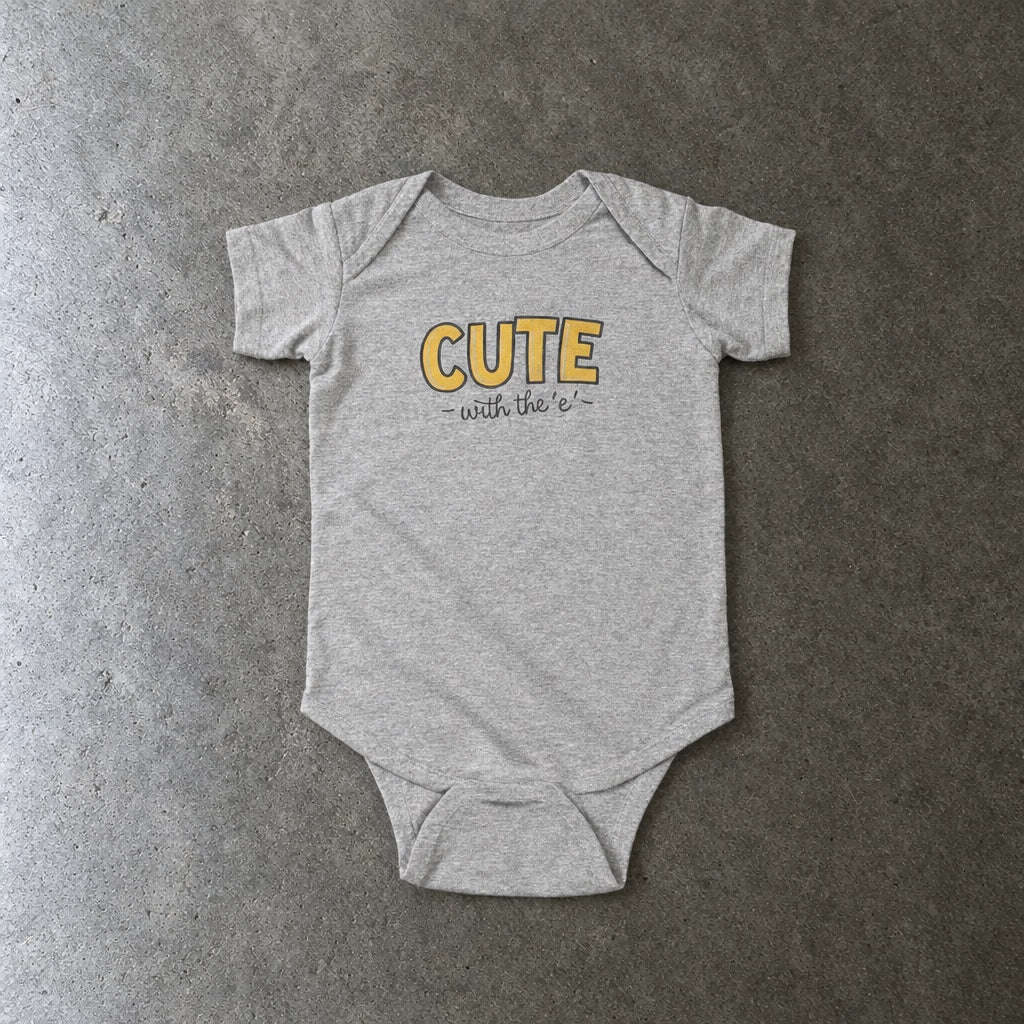 Cute with the E onesie in ash, laid flat