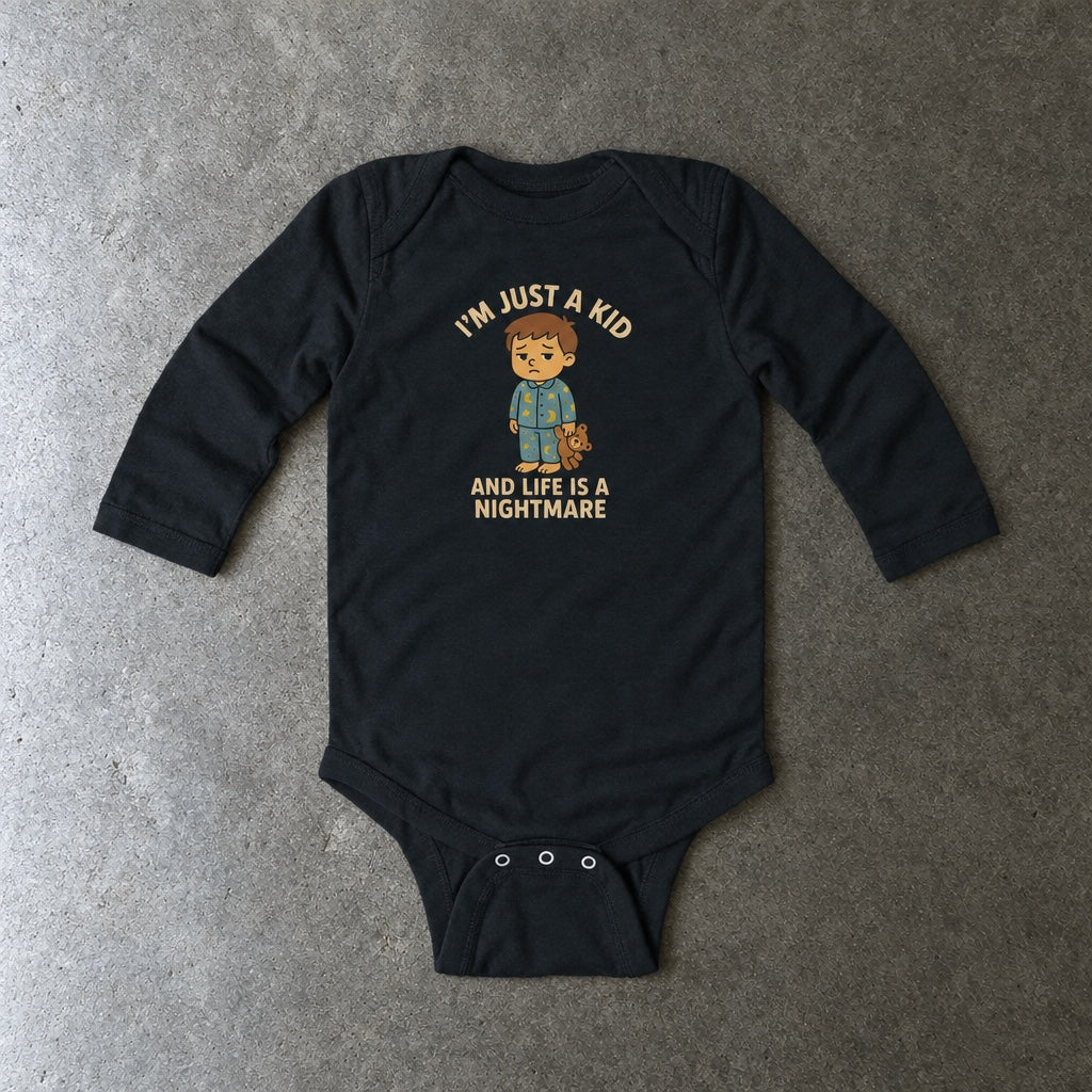 I'm Just A Kid long sleeve onesie in black, laid flat