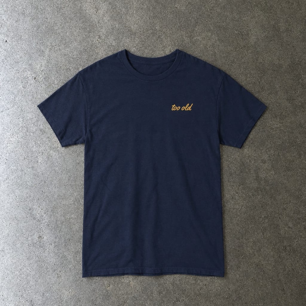 I'm Too Old For This Pit Danny Tee in navy, laid flat