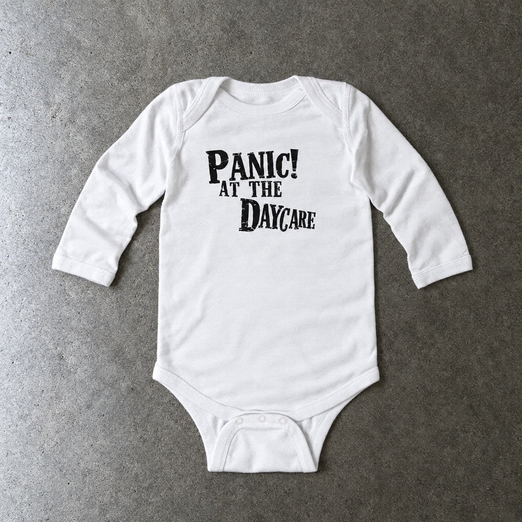 Panic! At The Daycare long sleeve onesie in white, laid flat