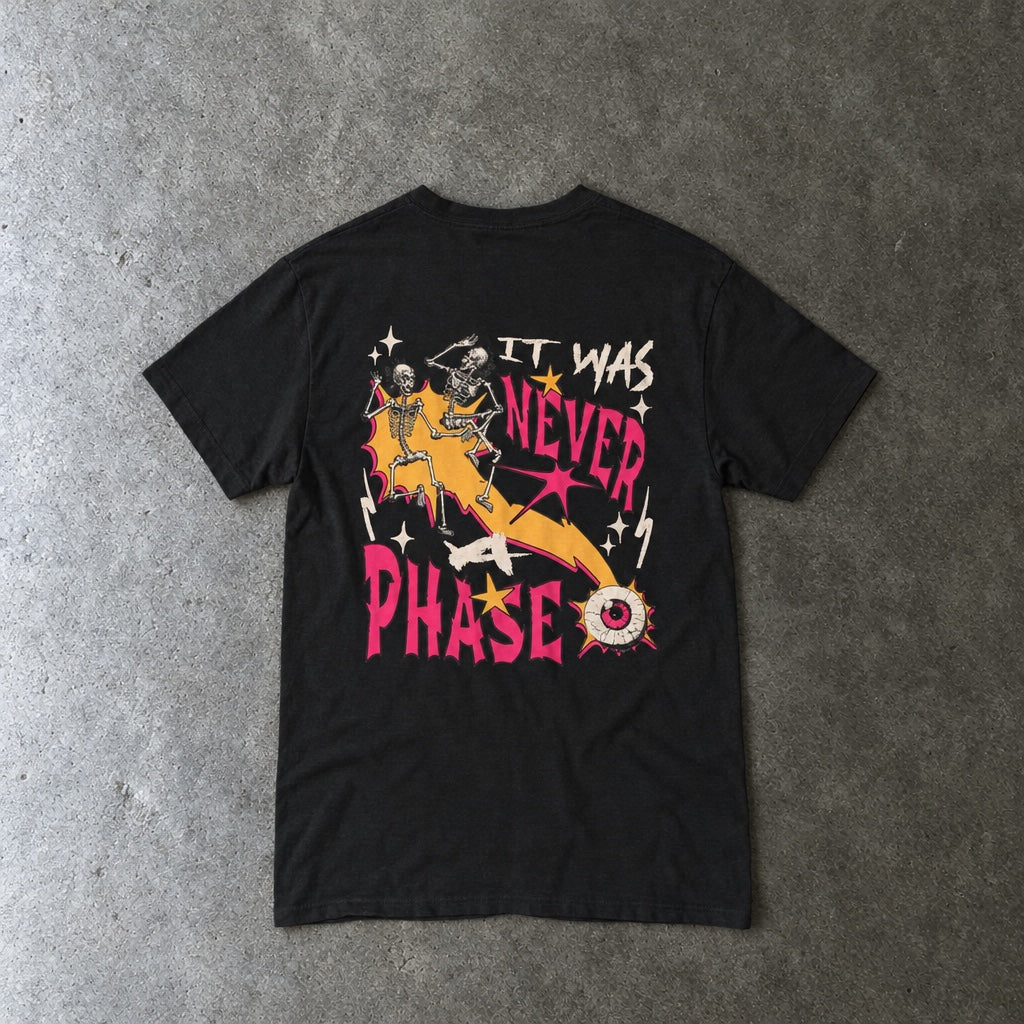 Still Emo Eyeball Tee toddler tee in black, laid flat, back view