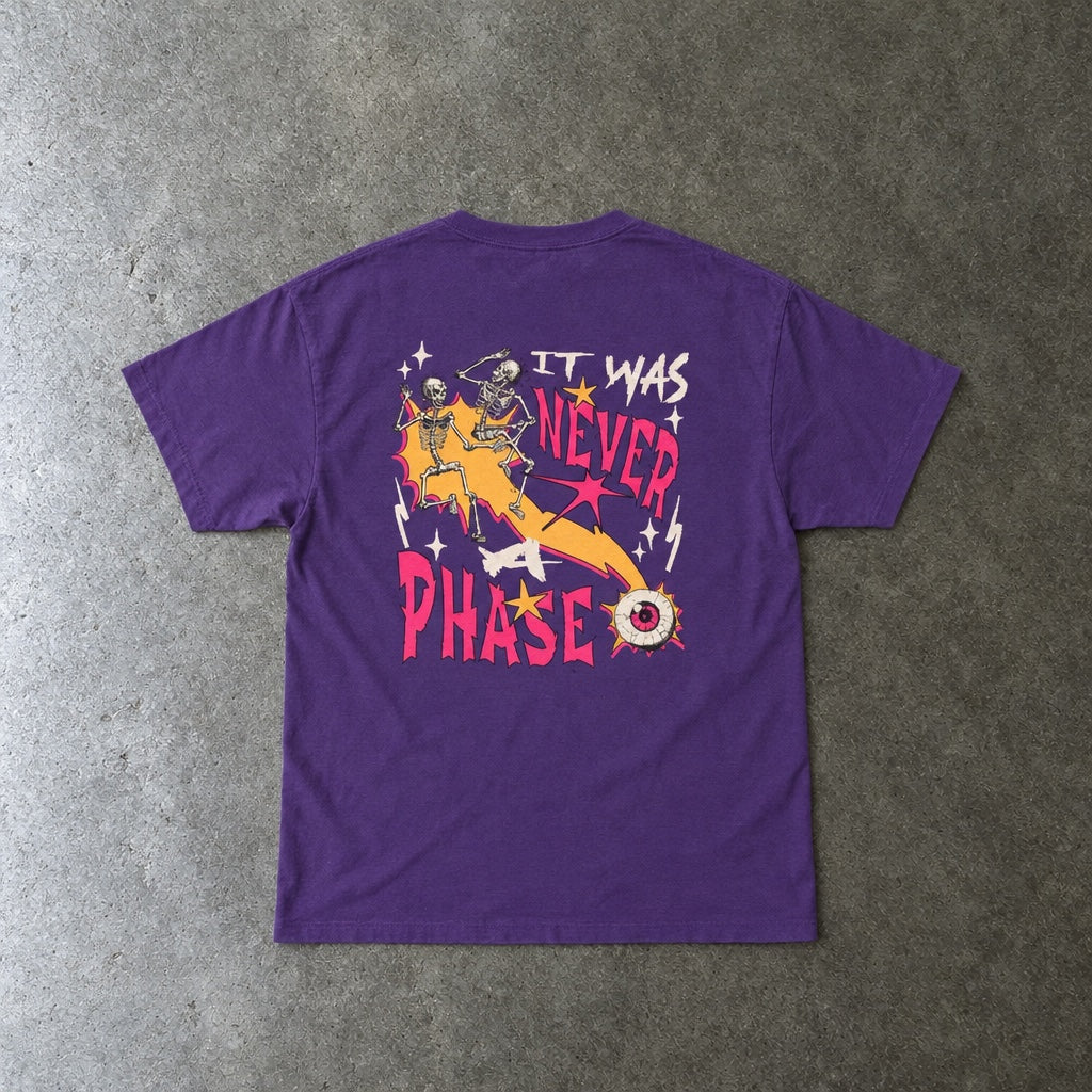 Still Emo Eyeball Tee toddler tee in purple, laid flat, back view