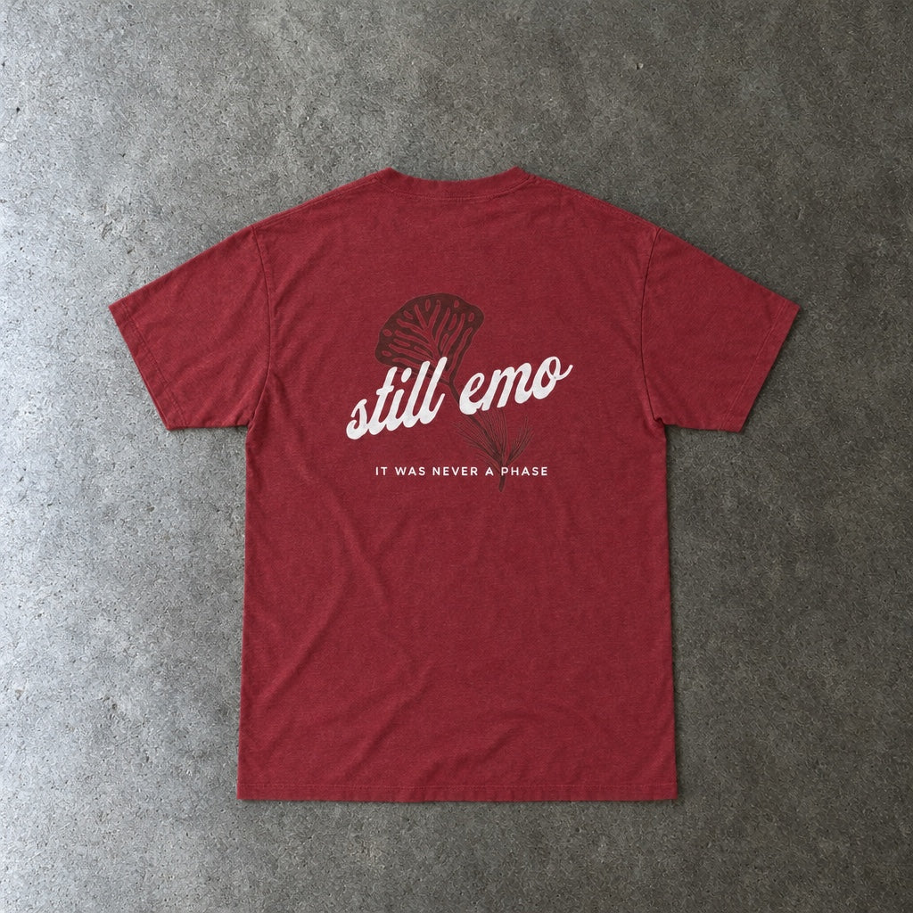 Still Emo Flower Tee toddler tee in antique cherry red, laid flat, back view