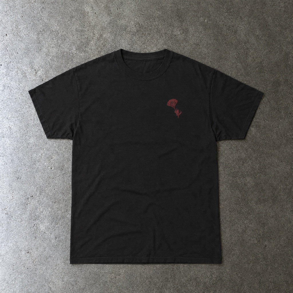 Still Emo Flower Tee toddler tee in black, laid flat