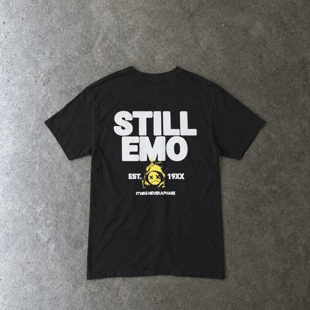 Still Emo Never A Phase Tee toddler tee in black, laid flat, back view