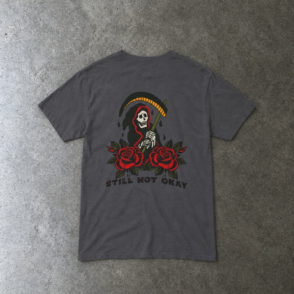 Still Not Okay Tee toddler tee in charcoal, laid flat, back view