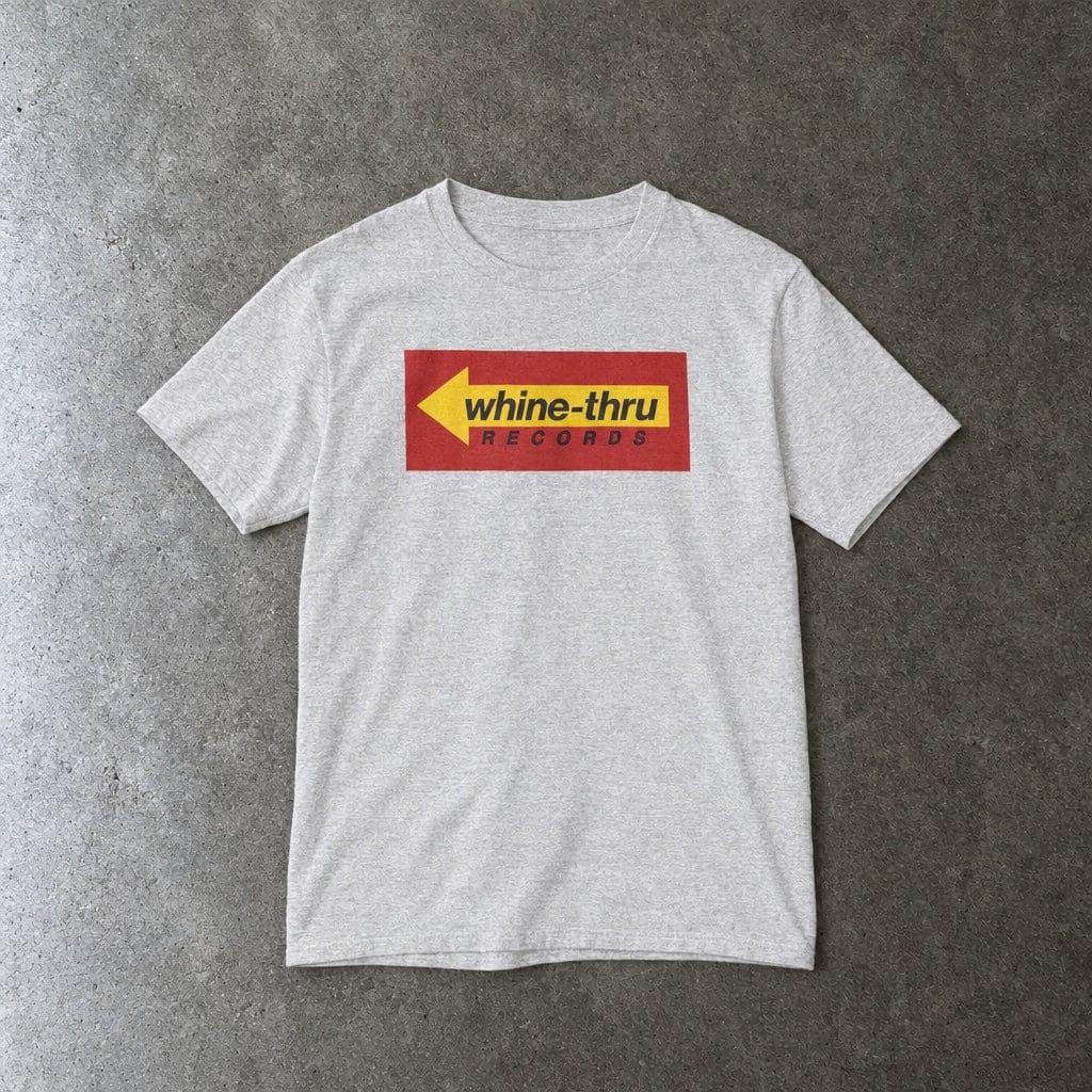 Whine-Thru Records youth tee in ash, laid flat