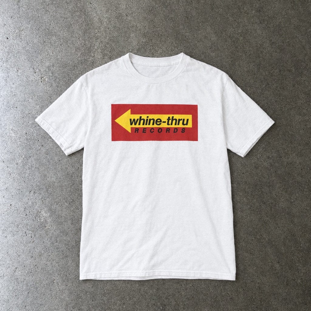 Whine-Thru Records youth tee in white, laid flat