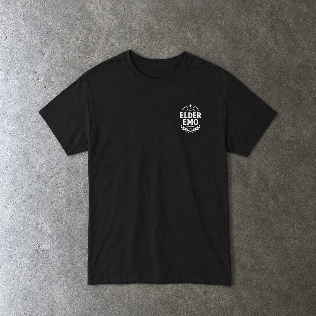 From Mosh Pits to Mezzanines Tee in black, laid flat