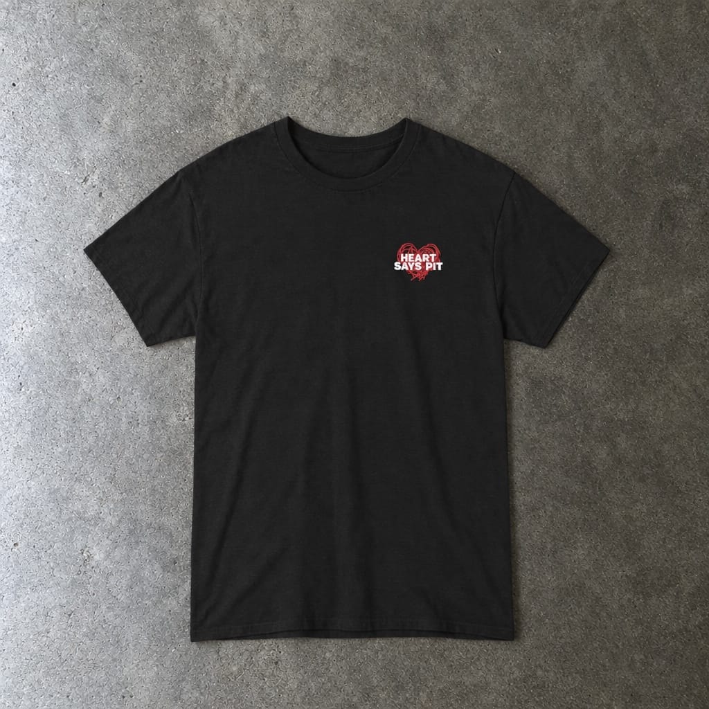 Hearts Says Pit, Back Says Balcony Tee in black, laid flat