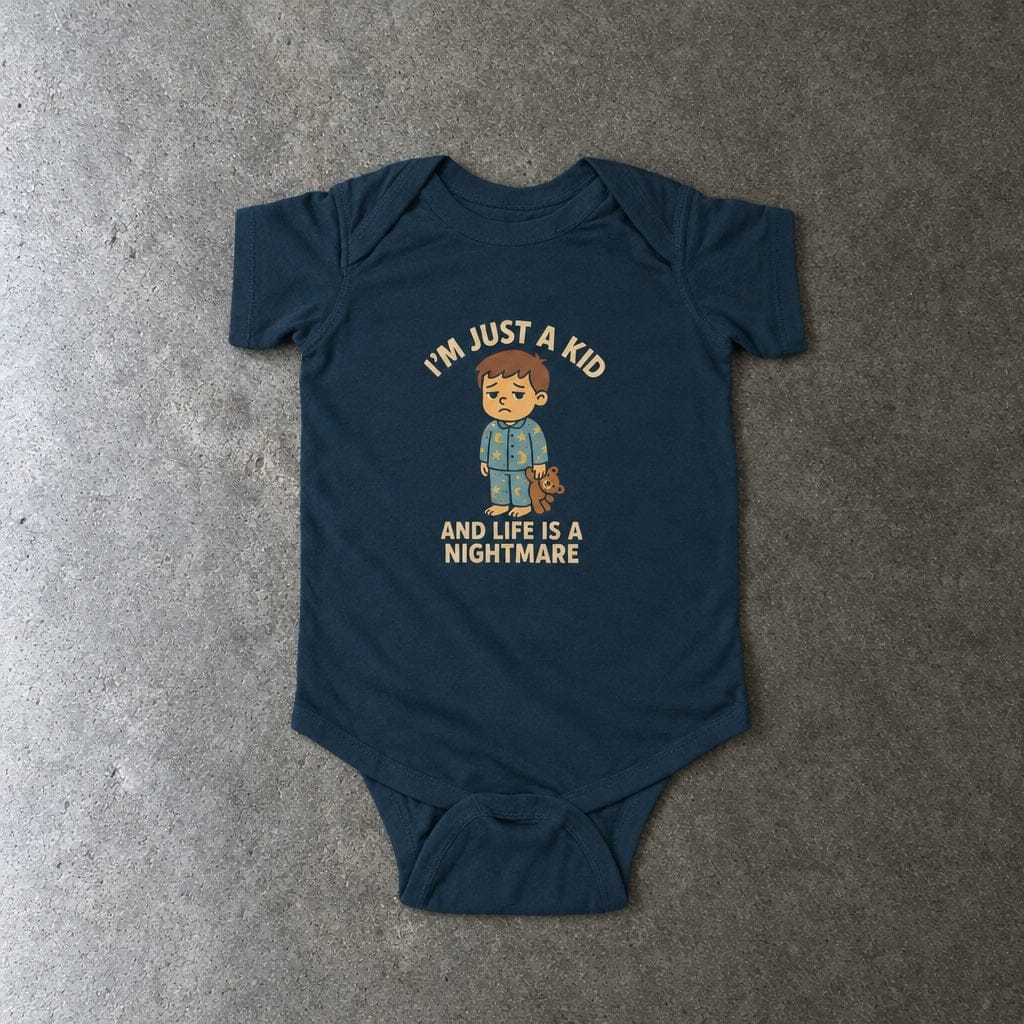 I'm Just A Kid onesie in navy, laid flat