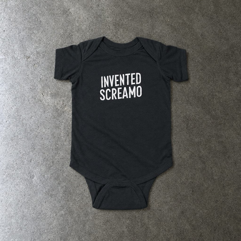 Invented Screamo onesie in black, laid flat