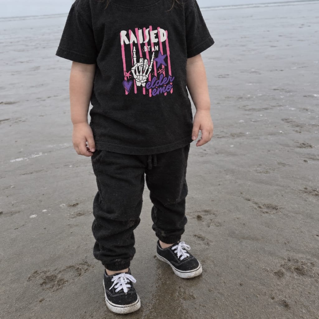 Toddler wearing the Raised by an Elder Emo 2.0 toddler tee