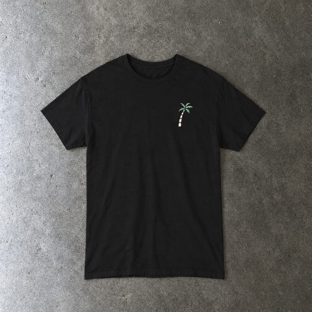 Still Emo Beach Club Tee in black, laid flat