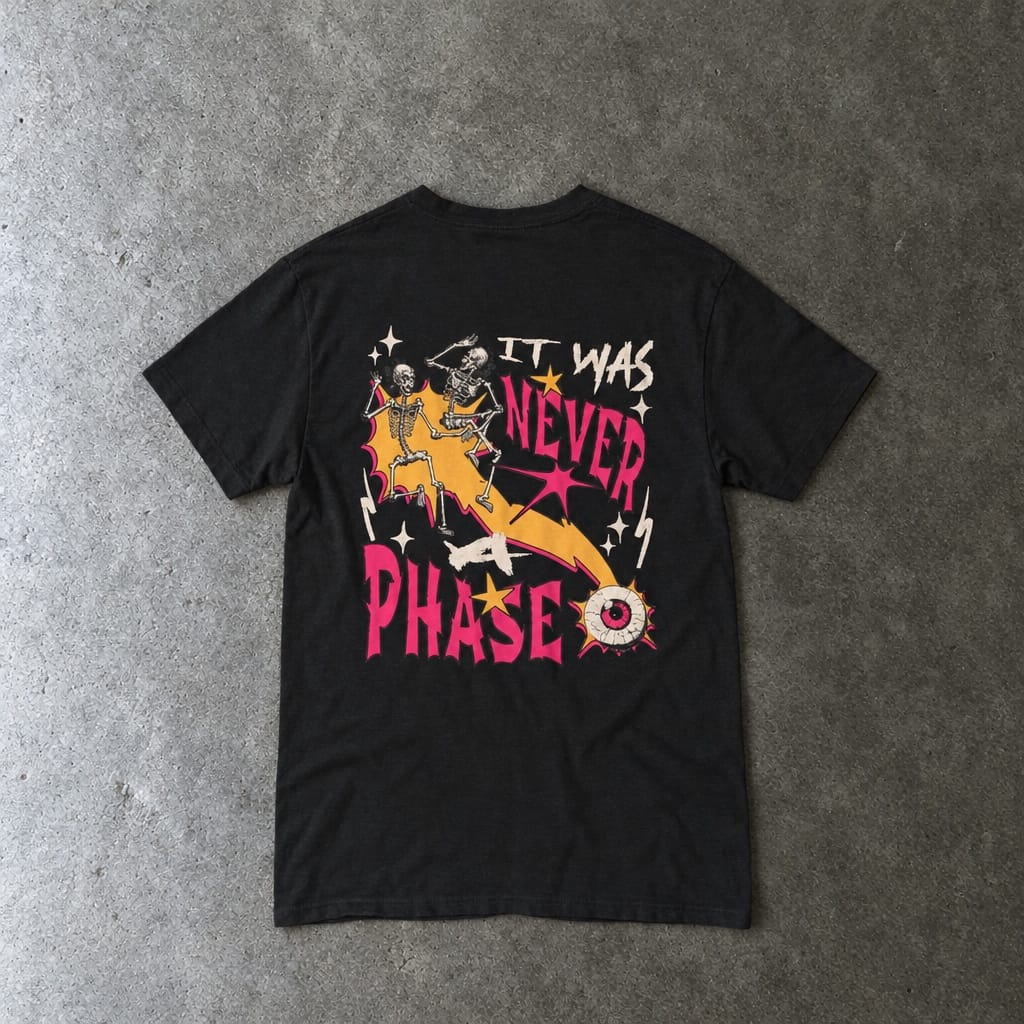 Still Emo Eyeball Tee in black, laid flat, back view