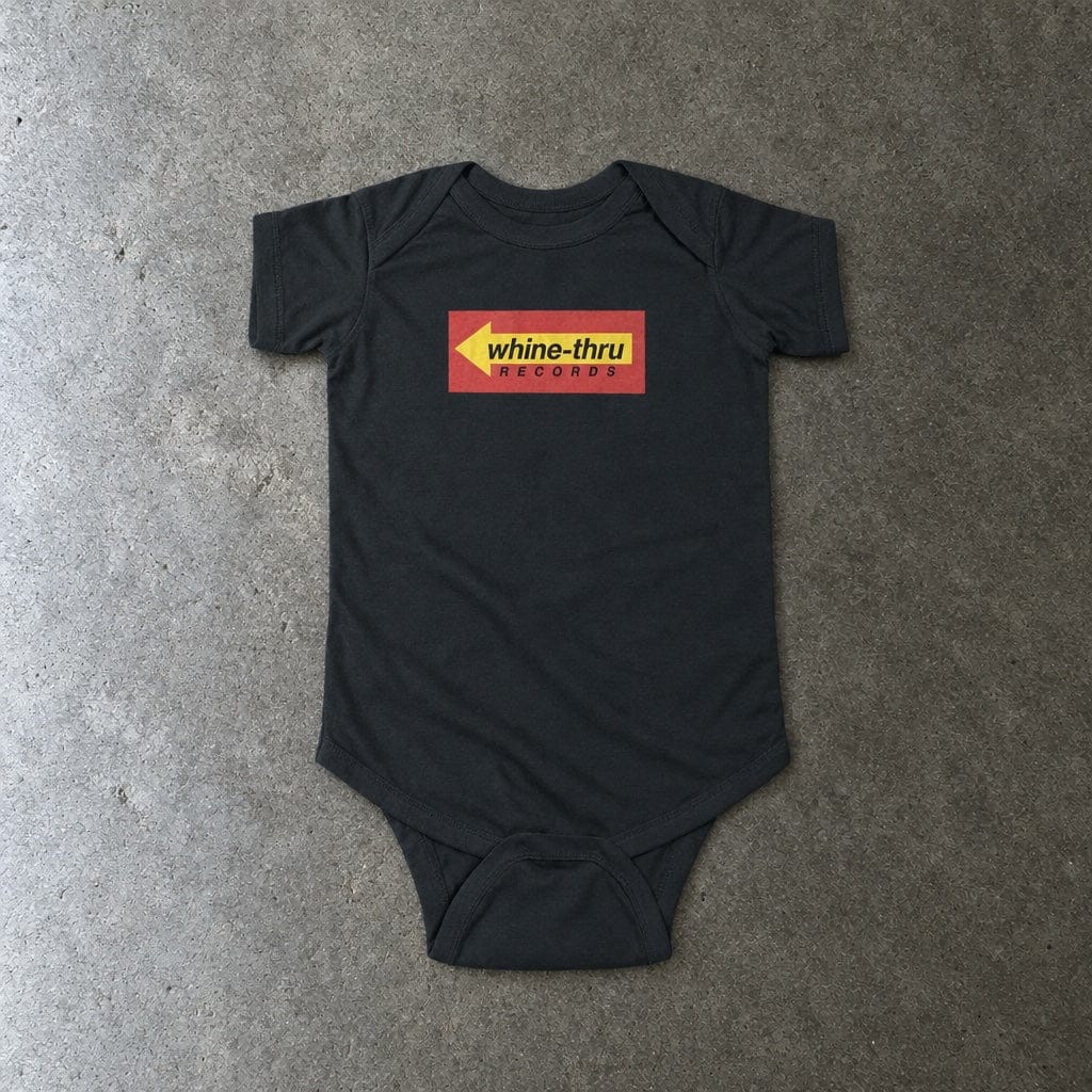 Whine-Thru Records onesie in black, laid flat