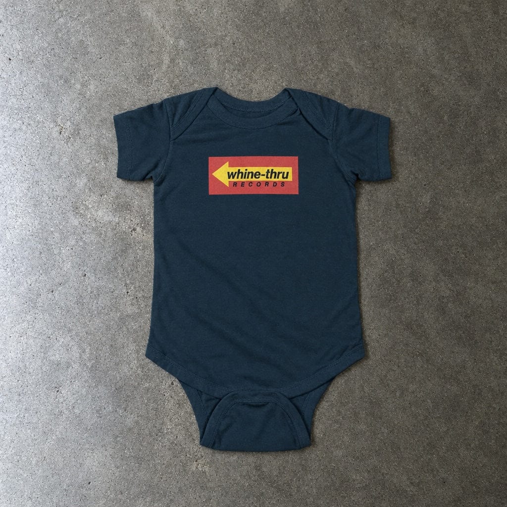 Whine-Thru Records onesie in navy, laid flat